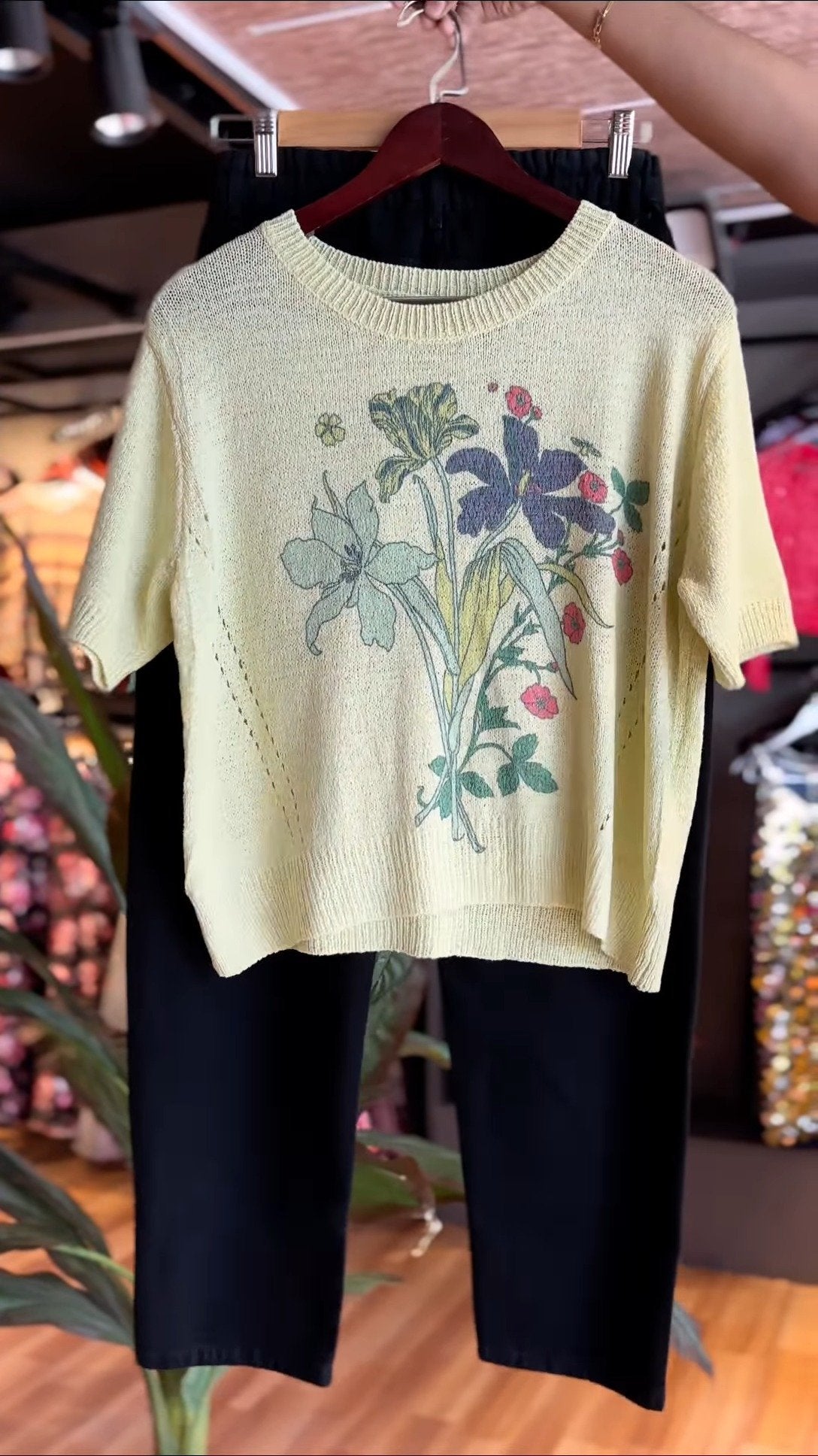 Pastel Botanical Knit Pullover with Classic Black Trousers – A Co-Ordinated Chic Ensemble