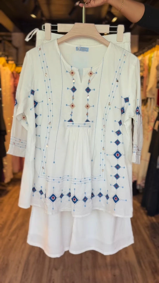 Ivory Embellished Cotton Kurta Set with Intricate Threadwork
