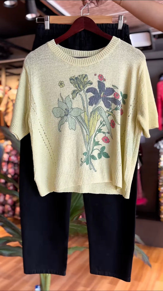 Pastel Botanical Knit Pullover with Classic Black Trousers – A Co-Ordinated Chic Ensemble