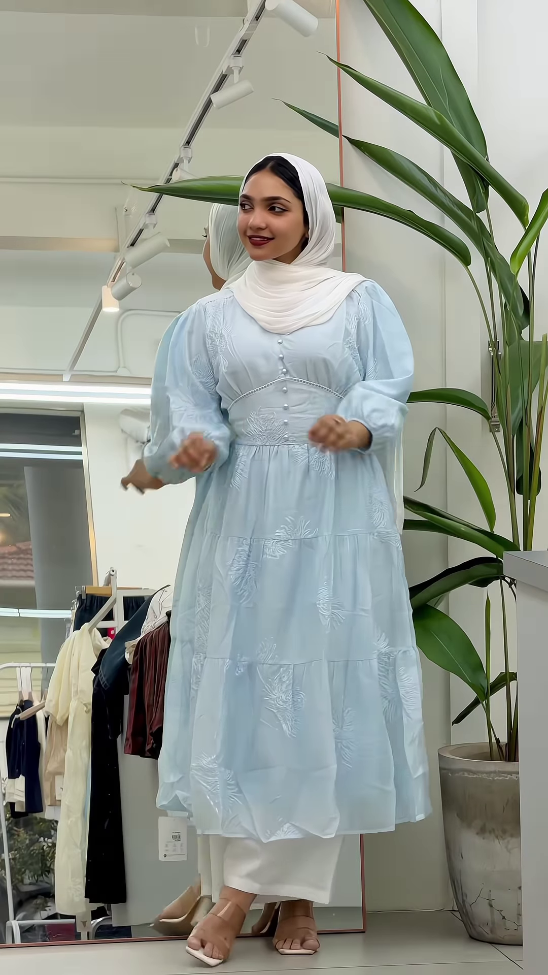 Sky Blue Knitted Vest and White Ruffled Blouse with Wide-Leg Denim