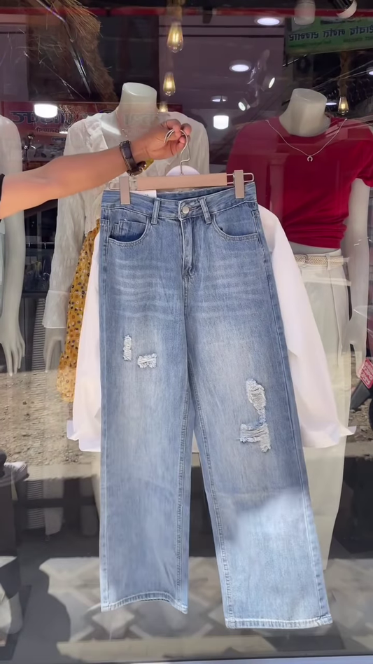 Embroidered White Shirt and Light-Wash Denim Ensemble